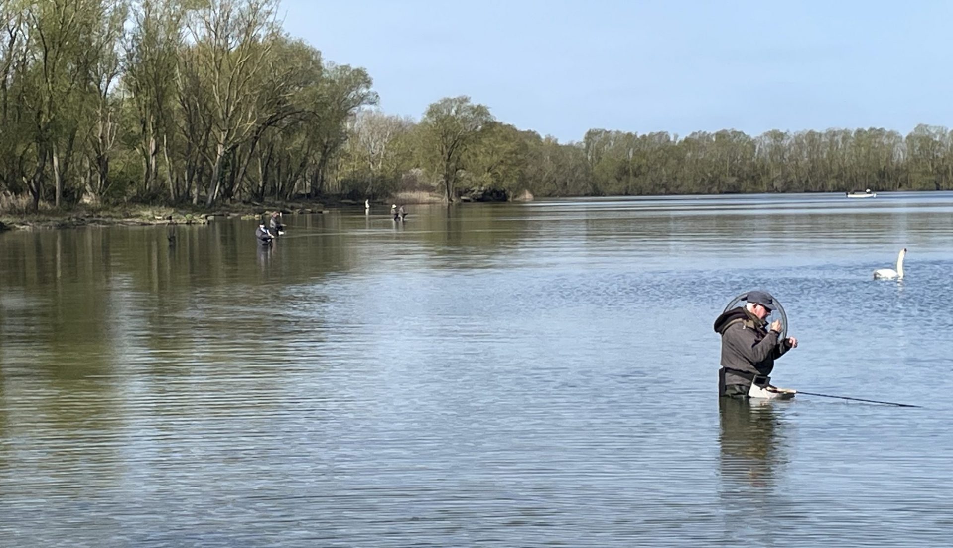 Man fly fishes at Grafham Water Fly Fishers Association after joining online using Clubmate