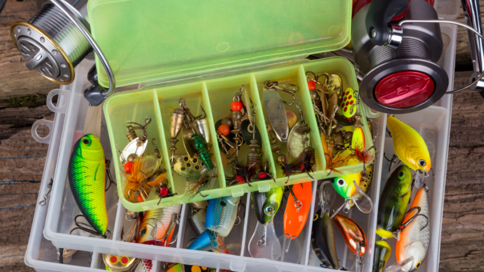 An angler reviews his latest purchases from their nearest fishing tackle shop.