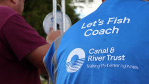 Let’s Fish coach stands ready to support junior anglers in their session, all in preparation for the National Celebration.